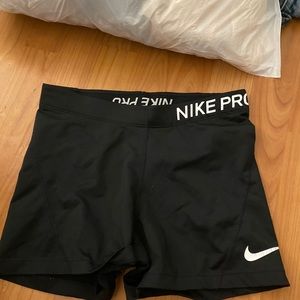 Black and white Nike Pro shorts